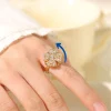 Clover spinning ring with stylish design and lucky charm