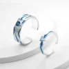 Exquisite Blue Topaz Sterling Silver Couple Ring featuring a vibrant blue topaz gemstone set in a polished sterling silver band, symbolizing timeless love and commitment, with an adjustable size for a perfect fit.